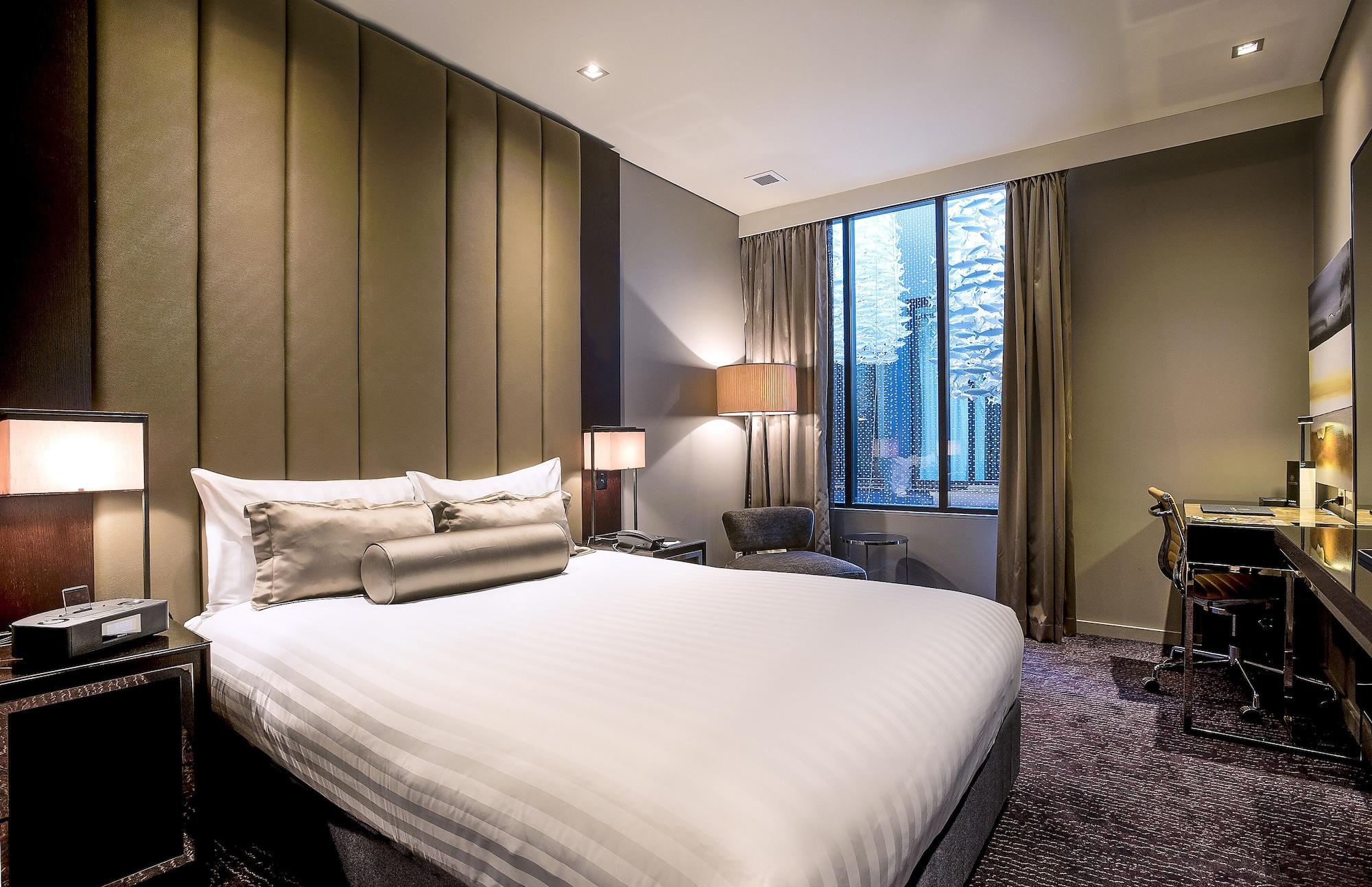 布里斯班甘巴罗酒店 外观 照片 A bedroom at the hotel